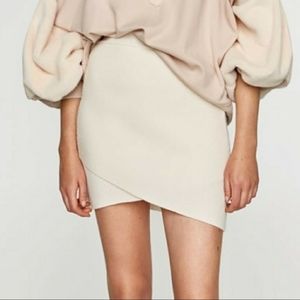 Zara asymmetrical ecru knit mini skirt